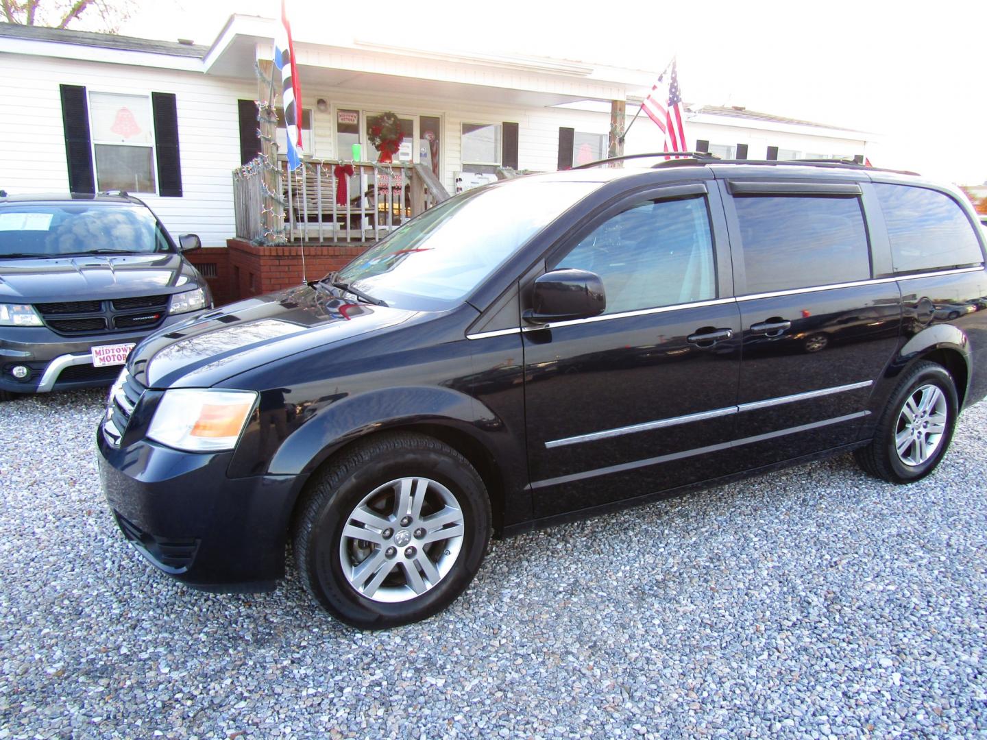 2010 Blue Dodge Grand Caravan SXT (2D4RN5DX9AR) with an 4.0L V6 SOHC 24V engine, Automatic transmission, located at 15016 S Hwy 231, Midland City, AL, 36350, (334) 983-3001, 31.306210, -85.495277 - Photo#2